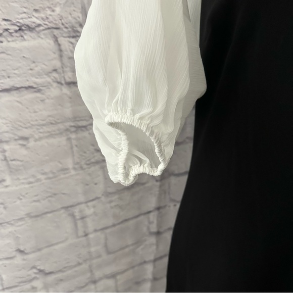 TOMMY HILFIGER
​Ruffle Mini A Line Dress - Picture 7 of 12